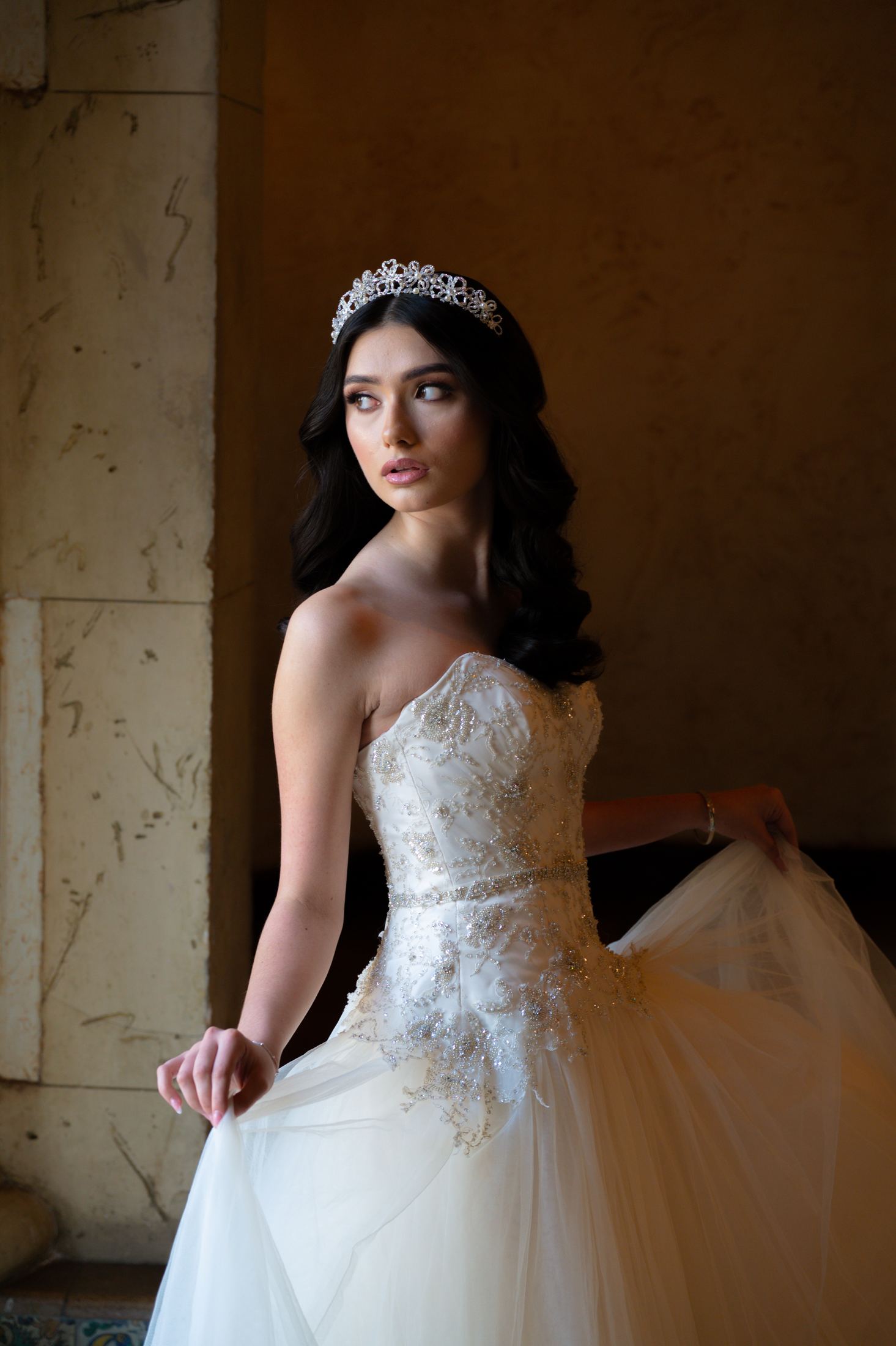 Professional wedding photography gear on a walnut desk in natural window light